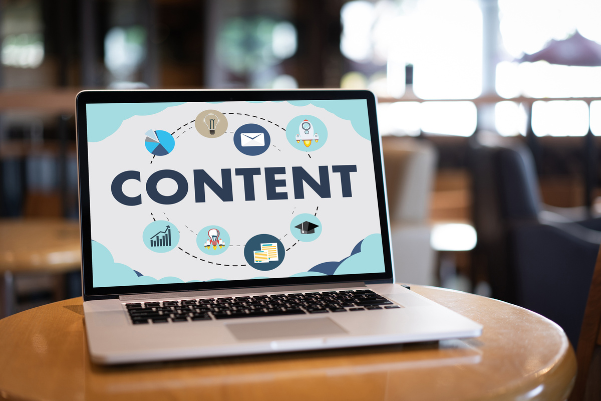 what is content marketing and how can it help your business? Shows a laptop with the word content displayed on the screen. It shows that for great marketing great content is necessary and sometimes mandatory.